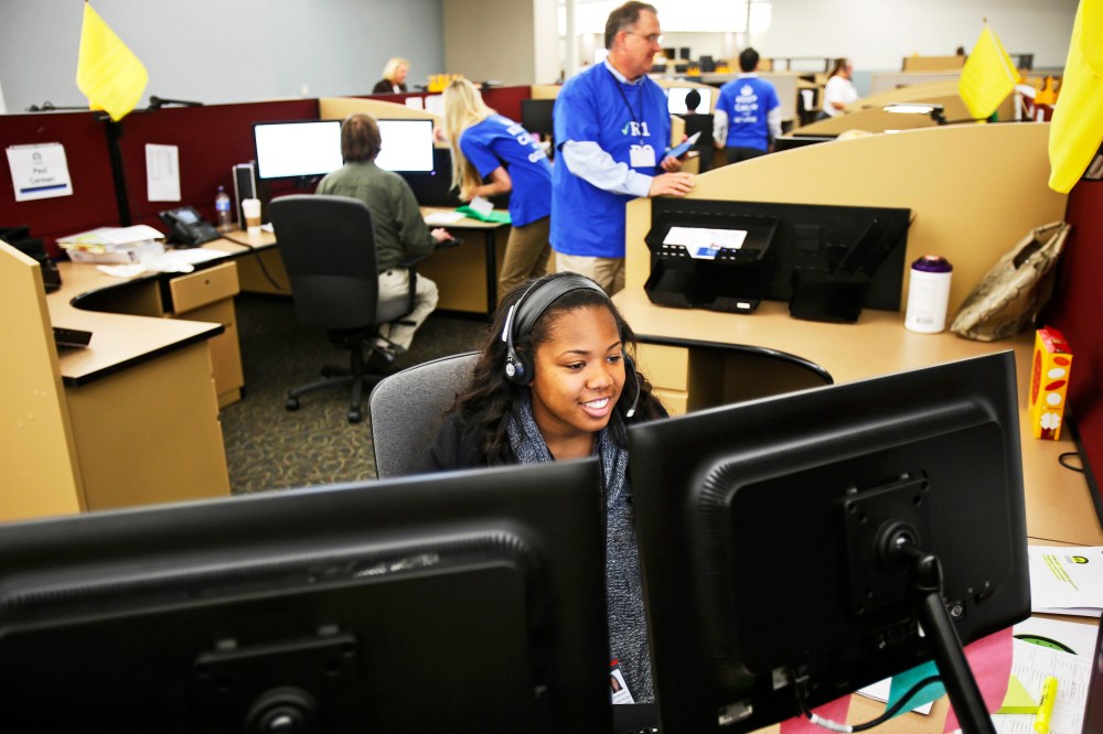 Shaldonia Barney, a service agent at Covered California's Concord call center, takes a call during the opening day of enrollment of the Patient Protection and Affordable Care Act in Concord, California October 1, 2013.