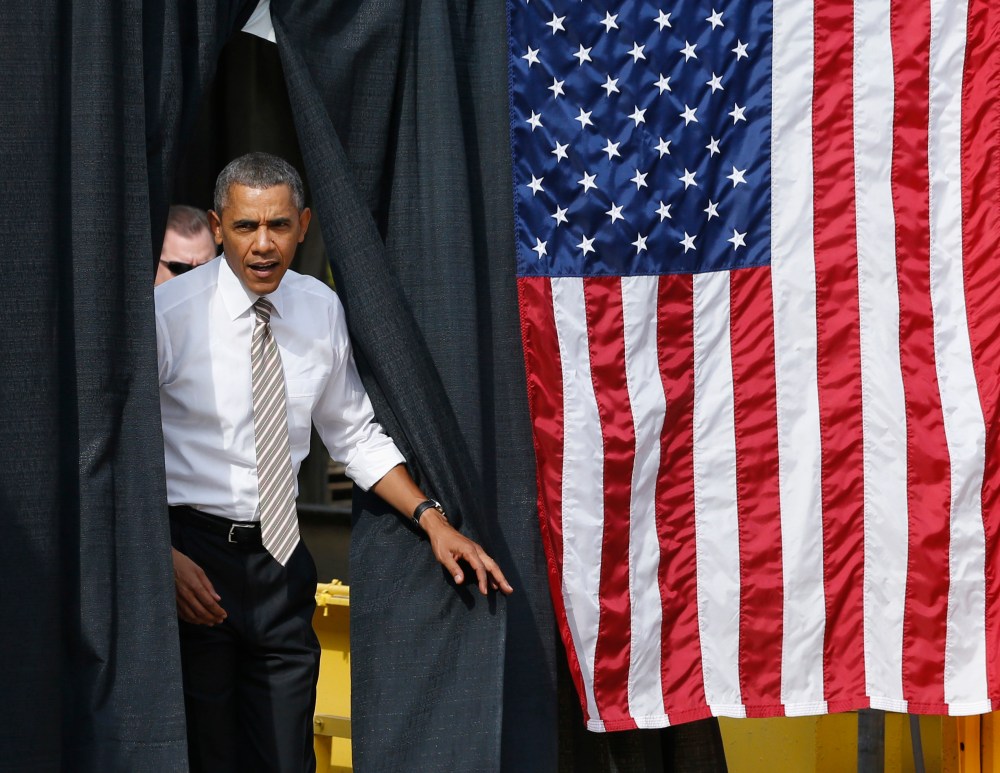 U.S. President Barack Obama arrives to deliver remarks on the government funding impasse at M. Luis Construction, a local small business in Rockville, Maryland, near Washington, October 3, 2013.
