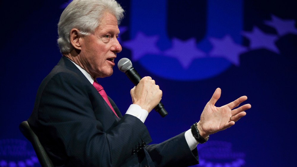 Former U.S. President Bill Clinton begins a discussion for the opening plenary session titled "The Age of Participation" on the first day of the 2014 Meeting of the Clinton Global Initiative University at Arizona State University in Tempe, Arizona, March