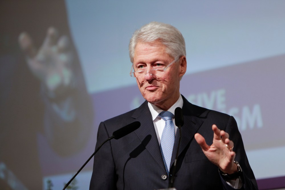 Former U.S. President Bill Clinton gives a keynote address at a conference in London, May 27, 2014.