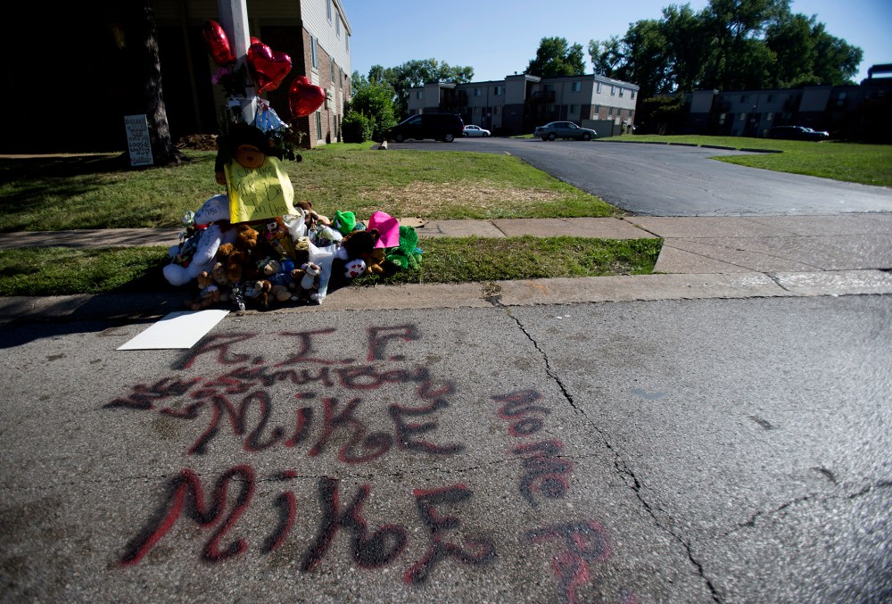 A makeshift memorial is pictured near where Michael Brown was shot to death in Ferguson, Mo., on August 12, 2014.