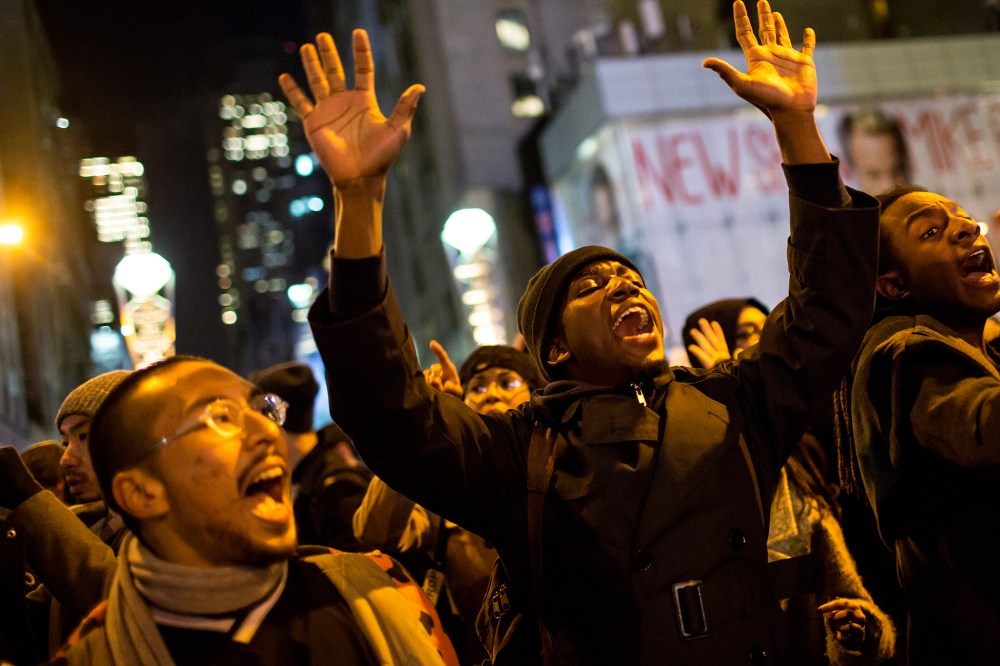 People take part in a protest against the grand jury decision on the death of Eric Garner in midtown Manhattan in New York, N.Y. on Dec. 3, 2014. (Photo by Eric Thayer/Reuters)