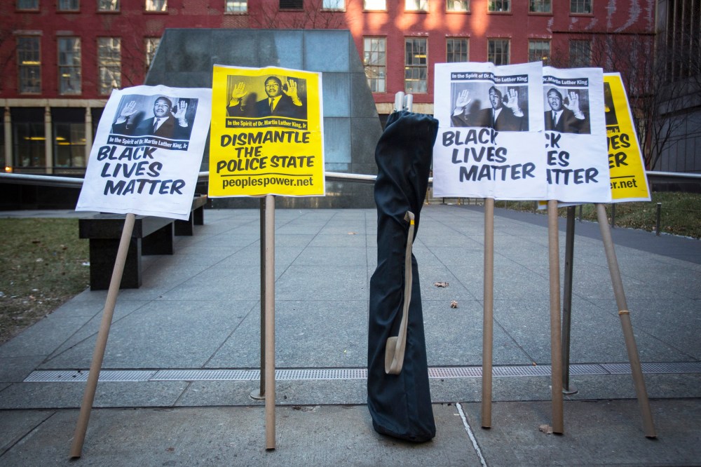 Signs are seen before a protest against police violence towards minorities in New York, N.Y. on Jan. 15, 2015. (Photo by Andrew Kelly/Reuters)