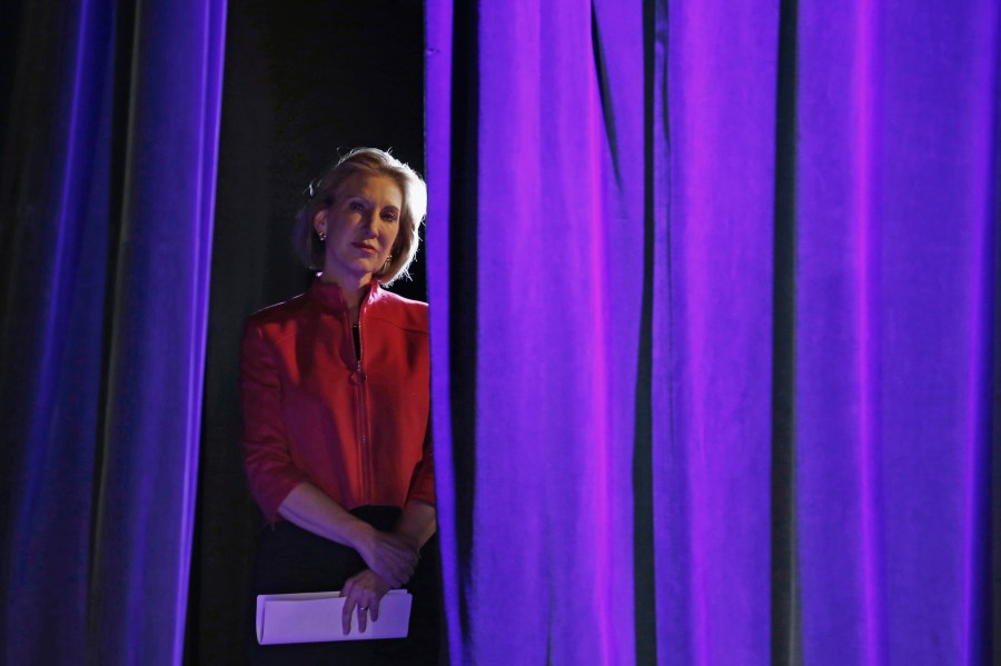 Former Hewlett-Packard Co Chief Executive Officer Carly Fiorina listens to her introduction from the side of the stage at the Freedom Summit in Des Moines, Ia., Jan. 24, 2015. (Photo by Jim Young/Reuters)