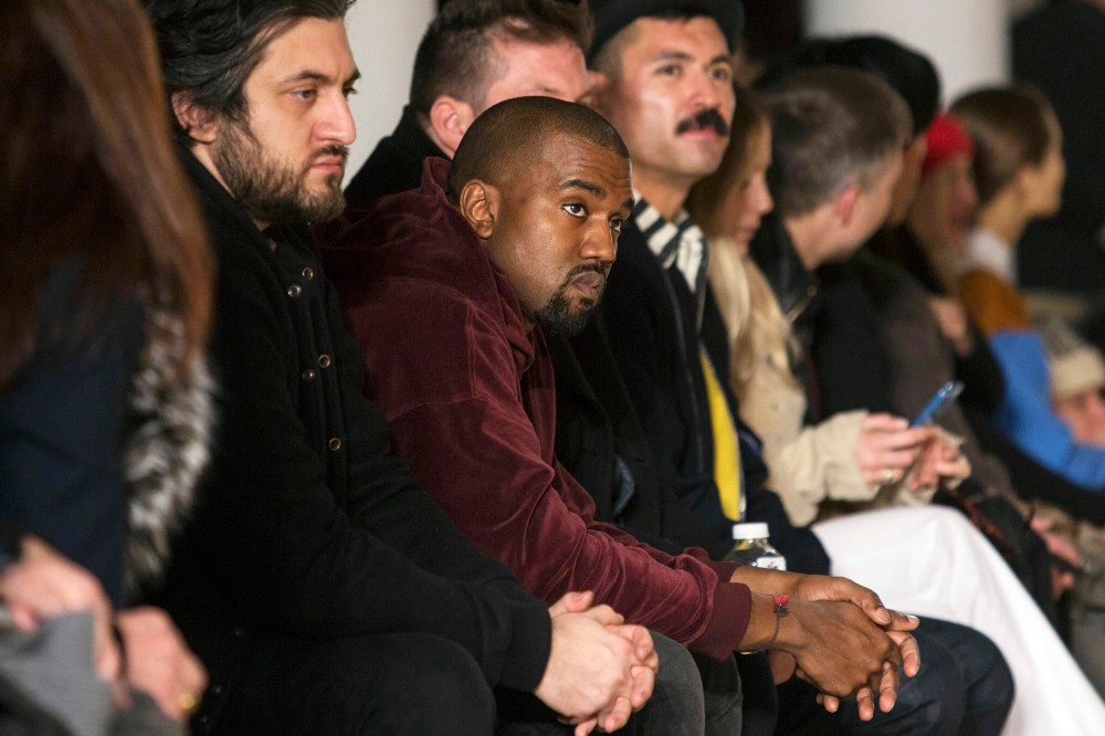 Singer Kanye West sits in the front row at the Jeremy Scott Fall/Winter 2015 collection show at New York Fashion Week on Feb. 18, 2015. (Photo by Andrew Kelly/Reuters)