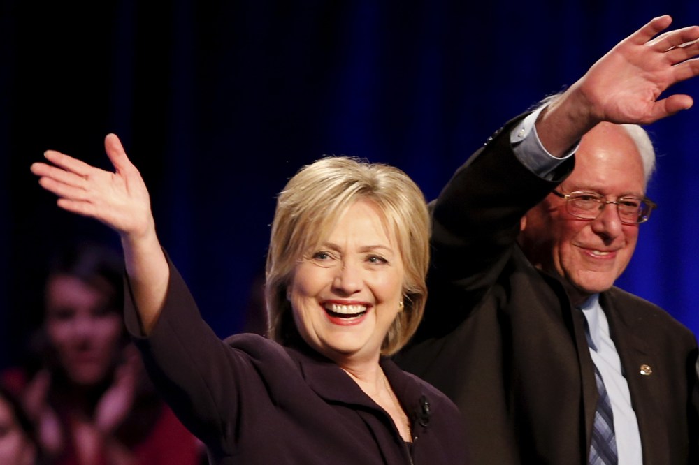 Democratic presidential candidates Hillary Clinton and Bernie Sanders wave following the First in the South Presidential Candidates Forum held at Winthrop University in Rock Hill, S.C. on Nov. 6, 2015. (Photo by Chris Keane/Reuters)