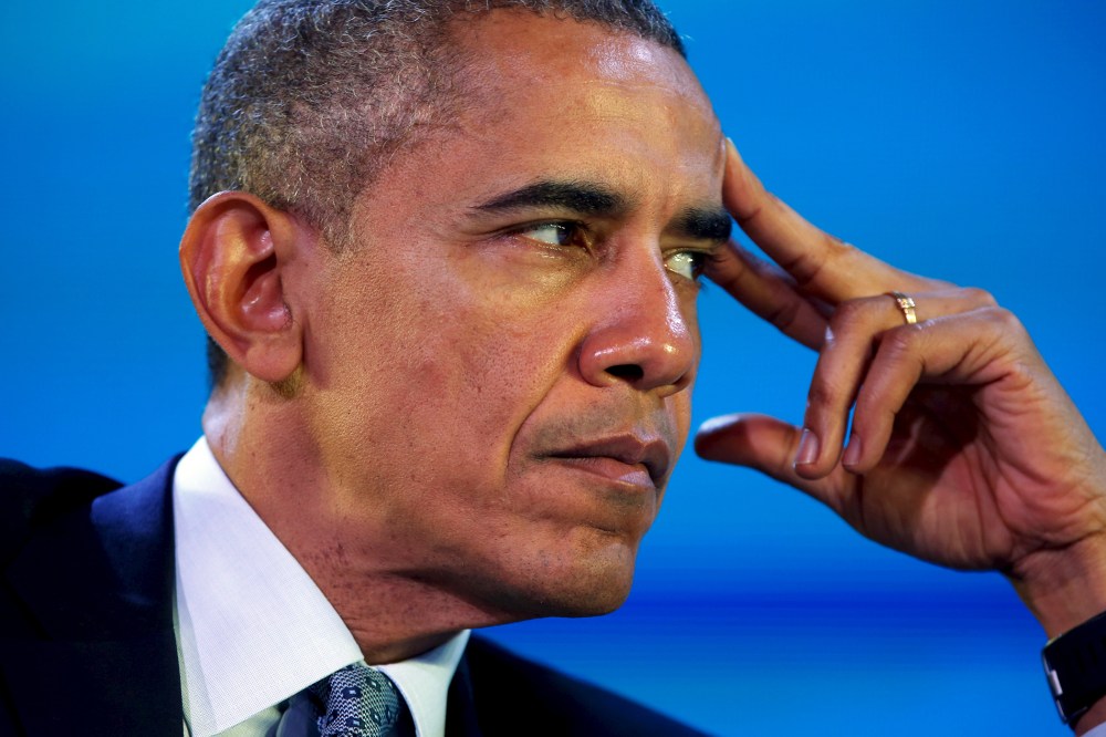 U.S. President Barack Obama listens closely during the APEC CEO Summit in Manila, Philippines, Nov. 18, 2015. (Photo by Jonathan Ernst/Reuters)