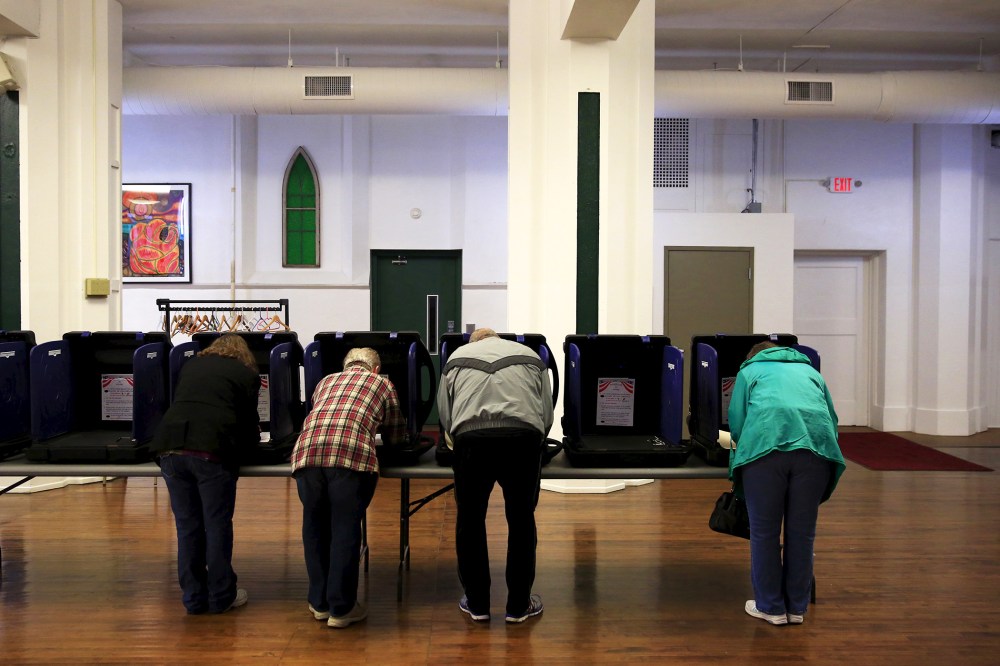 Voters cast their ballots for the Ohio primary at Saint Patrick's Social Hall in Youngstown, Ohio, March 15, 2016. (Photo by Aaron Bernstein/Reuters)