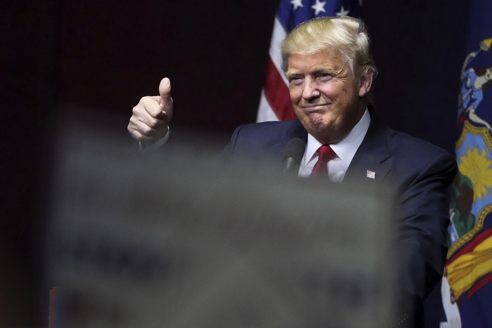 U.S. Republican presidential candidate Donald Trump speaks on stage during campaign event at Grumman Studios in Bethpage, N.Y. on April 6, 2016. (Photo by Carlo Allegri/Reuters)