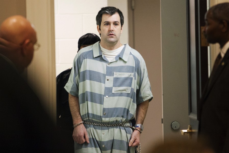 Former police officer Michael Slager walks to the defense table bond hearing, in Charleston, S.C., Sept. 10, 2015. (Photo by Randall Hill/Reuters)