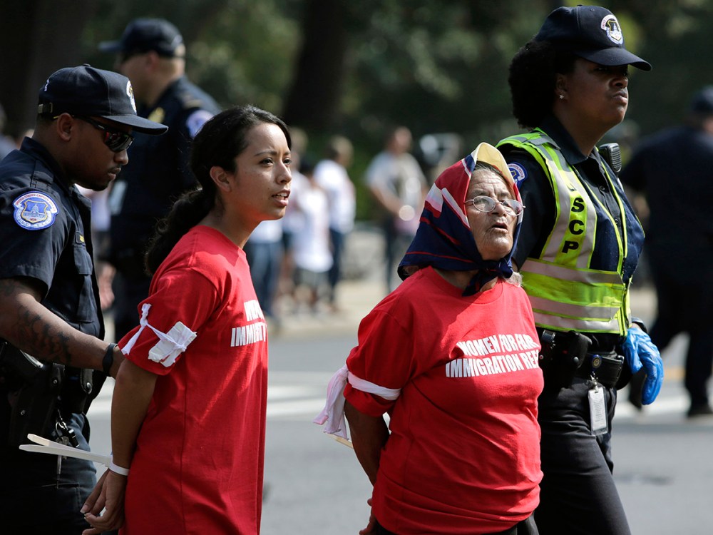 Women demanding fair immigration reform are arrested by police for blocking Independence Avenue