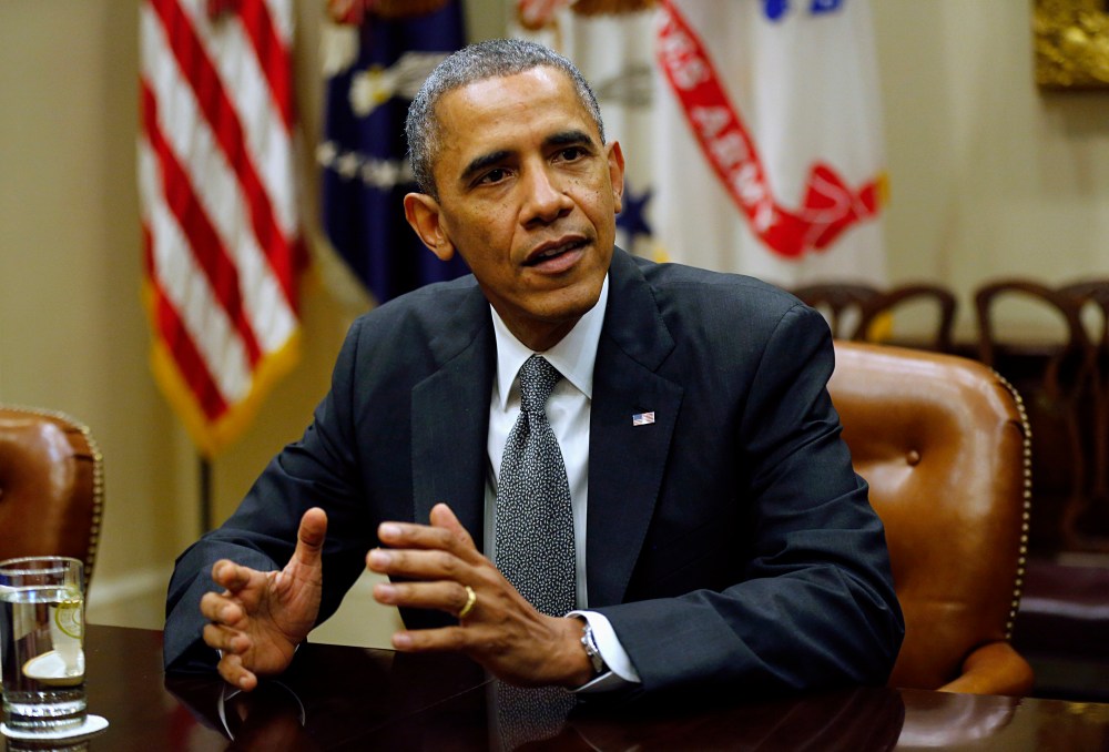 U.S. President Barack Obama holds a meeting with small business owners at the White House in Washington on October 11, 2013.