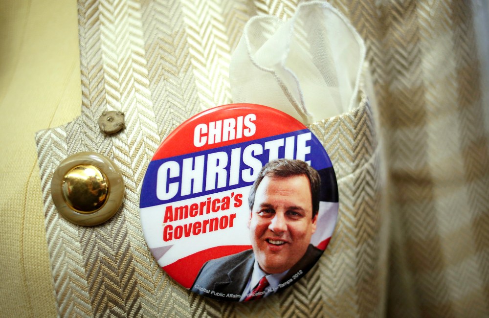 A supporter of New Jersey Governor Chris Christie wears a button during a campaign stop in Nutley Diner in Nutley, N.J. November 4, 2013.