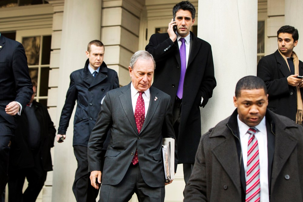 New York City mayor Michael Bloomberg departs City Hall, Dec. 19, 2013.