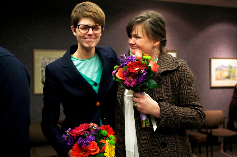 Natalie Dicou and her partner Nicole Christensen wait to get married at the Salt Lake County Clerks office, Dec. 20, 2013.