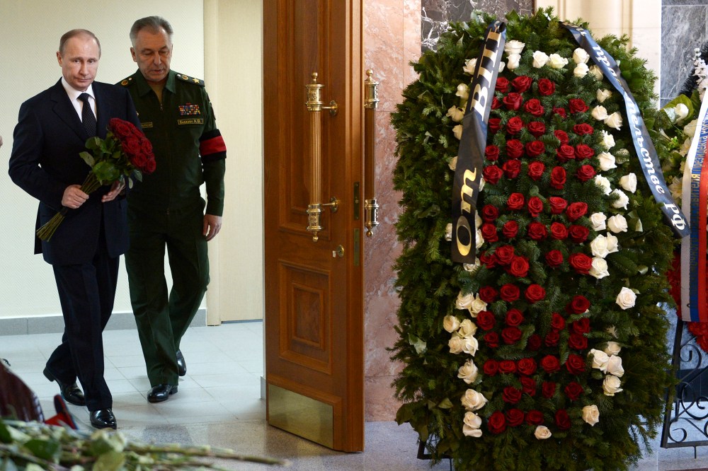 Russian President Vladimir Putin attends a commemoration ceremony for Mikhail Kalashnikovin in Mytischi, outside Moscow, December 27, 2013.