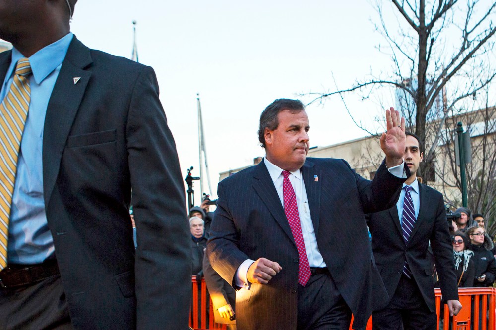 New Jersey Governor Chris Christie leaves city hall in Fort Lee, Jan. 9, 2014.