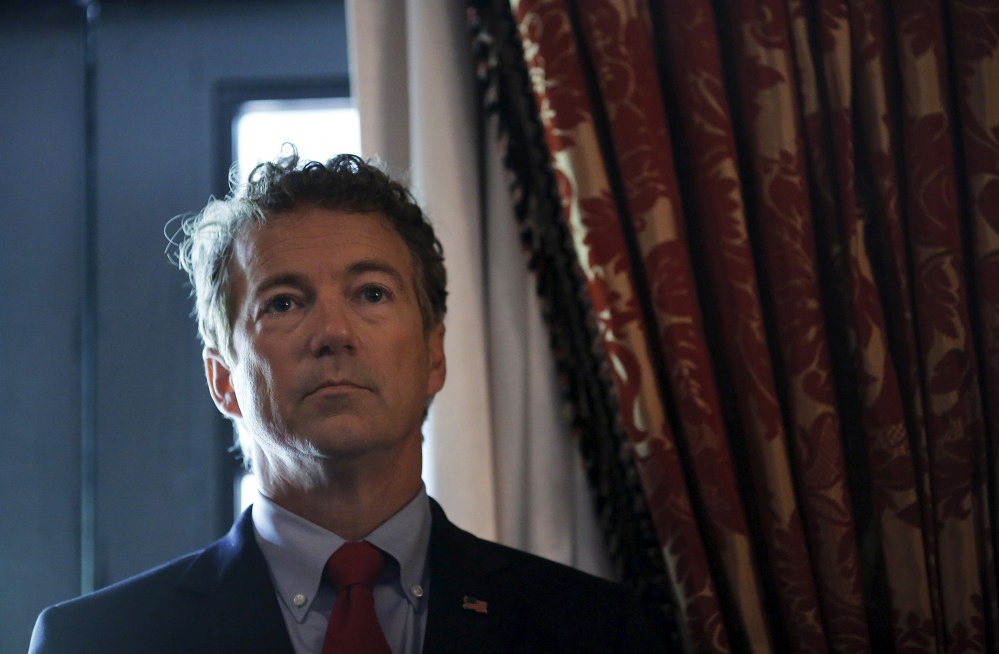 Republican presidential candidate Senator Rand Paul (R-KY) waits before addressing a legislative luncheon held as part of the "Road to Majority" conference in Washington, June 18, 2015. (Photo by Carlos Barria/Reuters)
