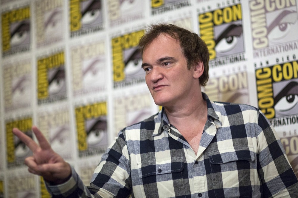Director Quentin Tarantino poses at a press line for his new film, "The Hateful Eight", during the 2015 Comic-Con International Convention in San Diego, Calif., July 11, 2015. (Photo by Mario Anzuoni/Reuters)