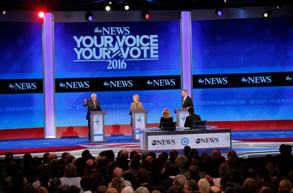 Democratic U.S. presidential candidates Bernie Sanders, Hillary Clinton and Martin O'Malley discuss issues at the presidential debate at St. Anselm College in Manchester, N.H., Dec. 19, 2015. (Photo by Brian Snyder/Reuters)
