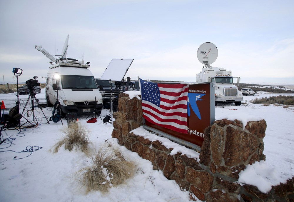 Media and satellite trucks are seen at the Malheur National Wildlife Refuge near Burns, Ore., Jan. 4, 2016. (Photo by Jim Urquhart/Reuters)
