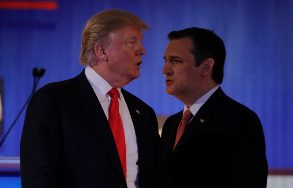 Republican U.S. presidential candidates Donald Trump and Ted Cruz cross paths during a break at the Fox Business Network Republican presidential candidates debate in North Charleston, S.C., Jan. 14, 2016. (Photo by Chris Keane/Reuters)
