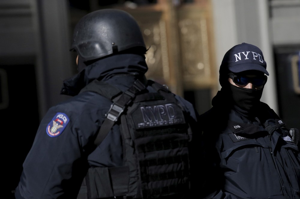 New York City Police officers (NYPD) work in Times Square in the Manhattan borough of New York, Jan. 20, 2016. (Photo by Brendan McDermid/Reuters)