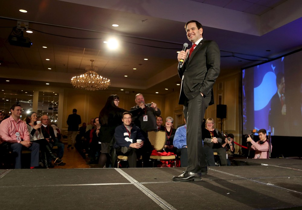 U.S. Republican presidential candidate and U.S. Senator Marco Rubio smiles as he takes questions after speaking at the New Hampshire GOP's FITN Presidential town hall in Nashua, N.H., Jan. 23, 2016. (Photo by Mary Schwalm/Reuters)