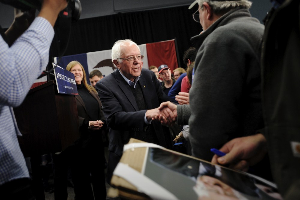 Democratic presidential candidate Bernie Sanders greets supporters after speaking at a town hall in Independence, Iowa, Jan. 24, 2016. (Photo by Mark Kauzlarich/Reuters)