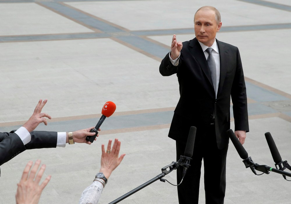 Russian President Vladimir Putin gestures during a meeting with journalists after a live broadcast nationwide call-in in Moscow, Russia, April 14, 2016. (Photo by Maxim Shemetov/Reuters)