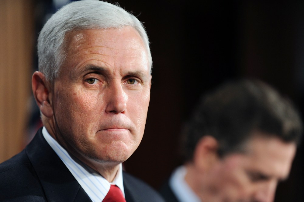 US Representative Mike Pence (R-IN) (L) and Senator Jim DeMint (R-SC) arrive for a news conference about their goal of permanently extending Bush-era tax rates at the Capitol in Washington, Dec. 2, 2010. (Photo by Jonathan Ernst/Reuters)