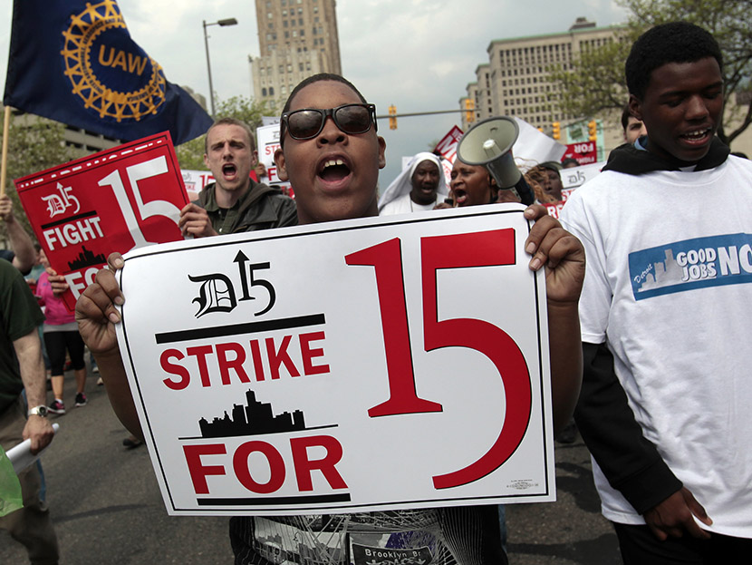A group of workers and labor activists march down West Grand Boulevard as they demand a raise in the minimum wage for fast food workers in Detroit, Michigan May 10, 2013. (Photo by Rebecca Cook/Reuters)