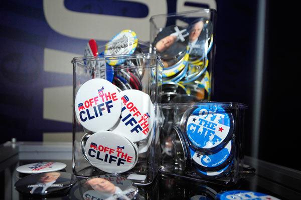 Off The Cliff buttons on display at the DNC