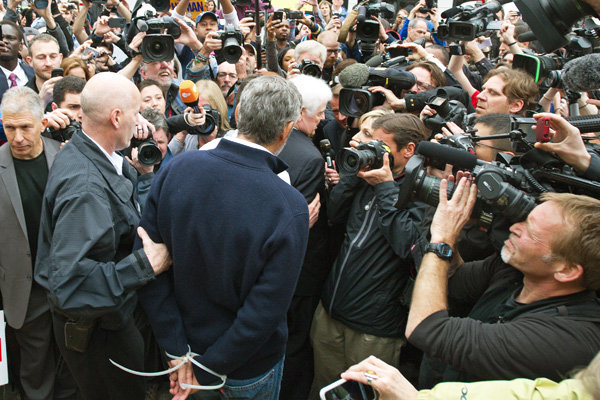 George Clooney and his father Nick Clooney getting  arrested outside Sudanese Embassy in Washington, D.C. on Friday.
