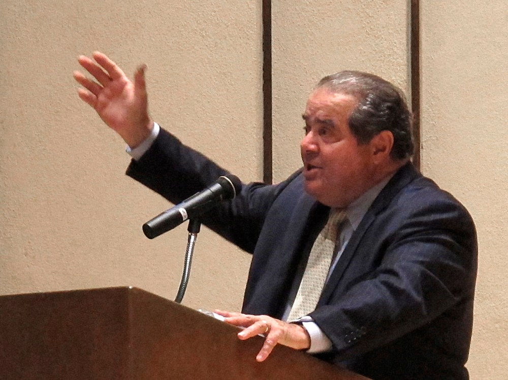 File Photo: U.S. Supreme Court Justice Antonin Scalia speaks at the University of Wyoming in Laramie Thursday, Oct. 25, 2012. Passing through Laramie after an unsuccessful antelope hunt, Scalia stopped at the university to make an impassioned and...