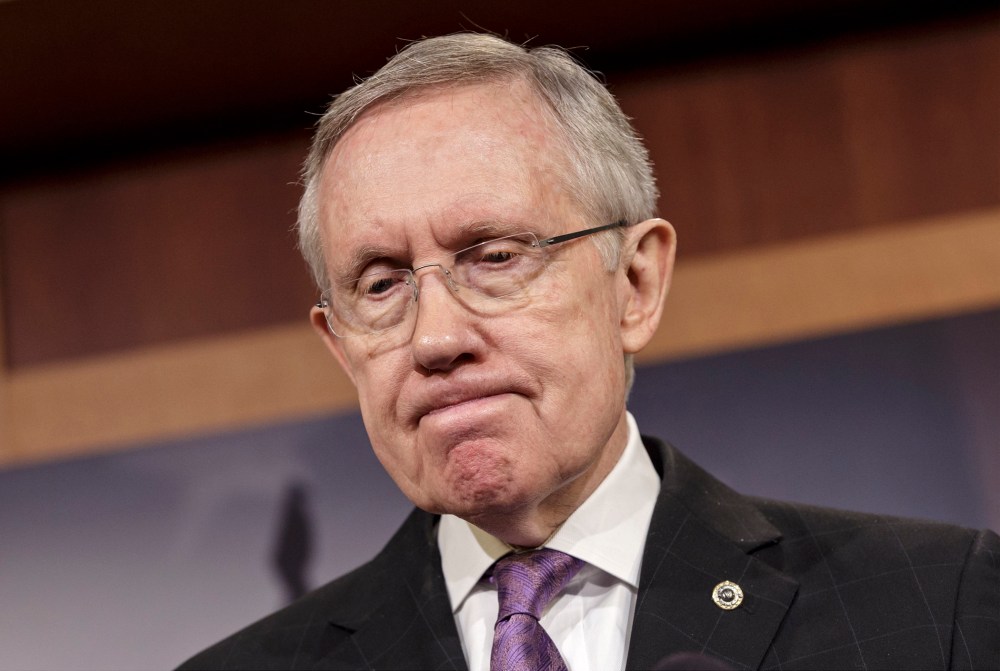 Senate Majority Leader Harry Reid, D-Nev., talks to reporters about the final work of the Senate as their legislative year nears to a close, at the Capitol in Washington, Thursday, Dec. 19, 2013.