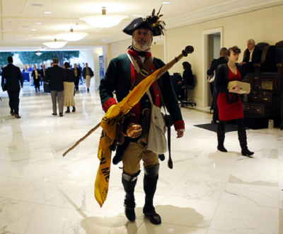 File photo: Tea Party activist William Temple, dressed as a patriot, arrives for the Conservative Political Action Conference (CPAC) at National Harbor. (Photo by: Kevin Lamarque/Reuters)