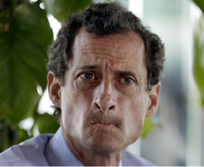 New York mayoral candidate Anthony Weiner listens to other candidates during a candidate forum on small business, in the Inwood section of the borough of Manhattan, in New York, Tuesday, July 30, 2013. (Photo by Richard Drew/AP)