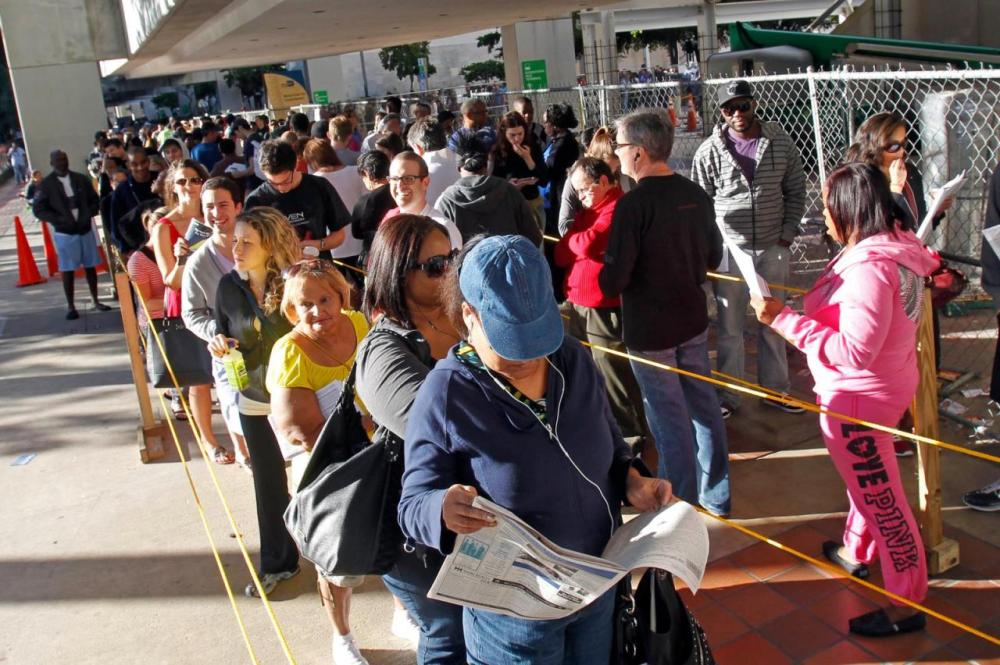 In this Nov. 3, 2012, photo, South Floridians stand in line during the last day of early voting in Miami. (AP Photo/Alan Diaz)