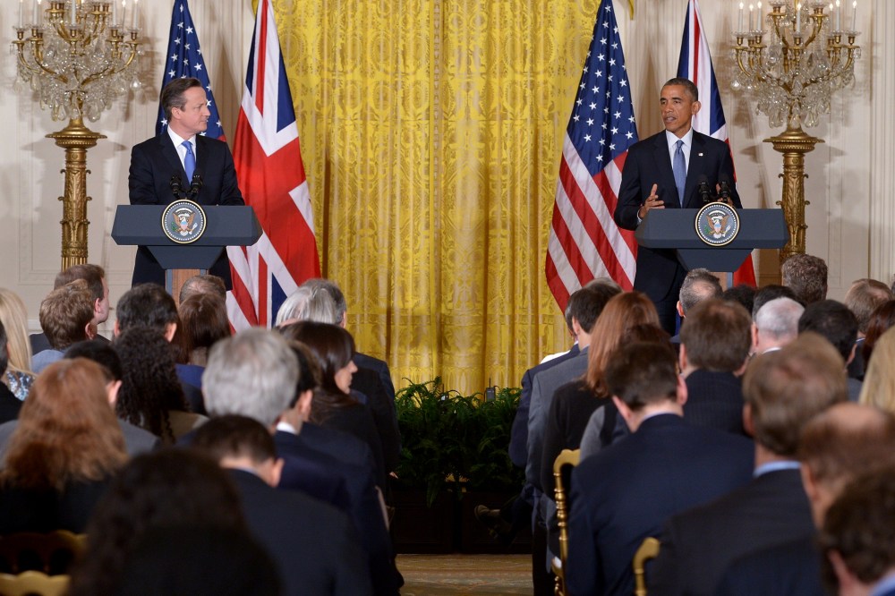 US President Barack Obama (R) and Britain's Prime Minister David Cameron hold a press conference in the East Room of the White House on Jan. 16, 2015, in Washington, DC. (Photo by Mandel Ngan/AFP/Getty)