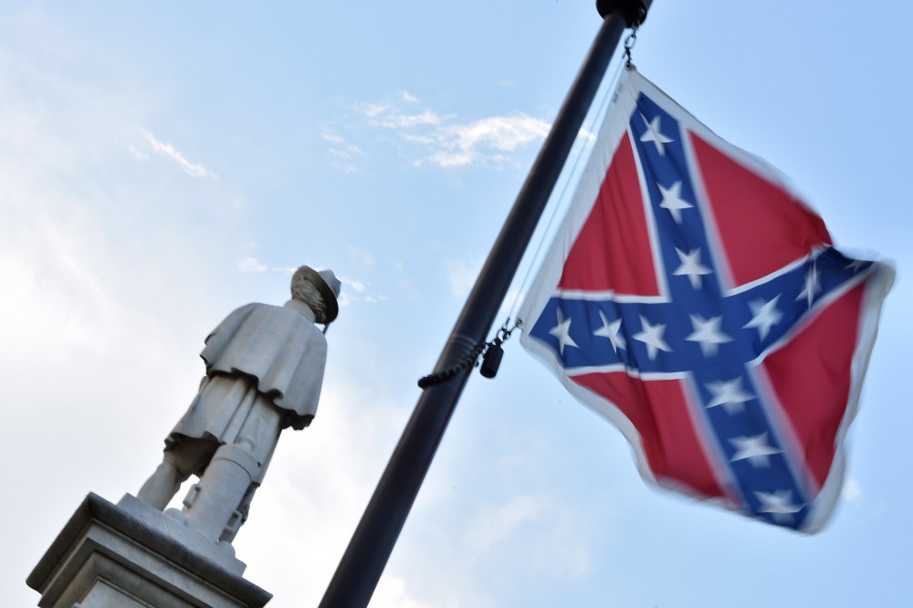 The Confederate flag is seen next to the monument of the victims of the Civil War in Columbia, S.C., on June 20, 2015. (Photo by Mladen Antonov/AFP/Getty)