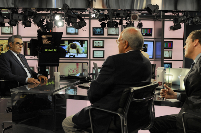 Actor Eugene Levy talks with Mike Barnicle and Willie Geist on the set of Morning Joe
