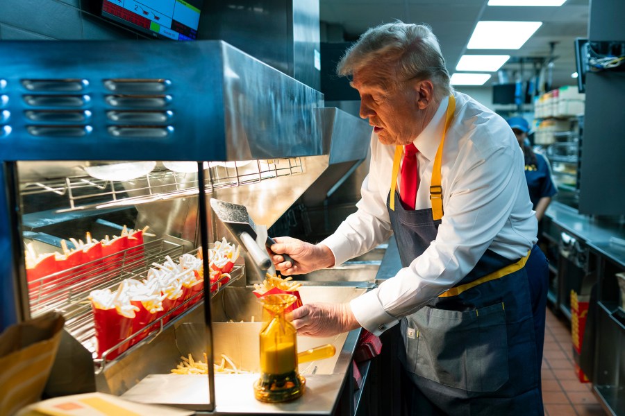 Donald Trump works behind the counter during a campaign event at McDonald's restaurant in Feasterville-Trevose, P.A.