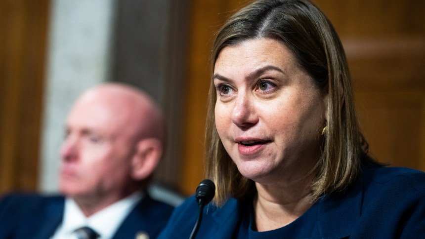 Sen. Elissa Slotkin, with Sen. Mark Kelly in the background.