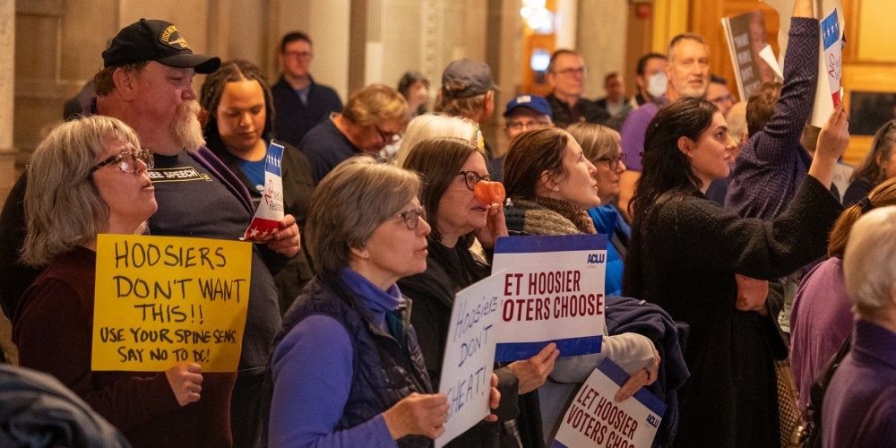 Demonstrators protest at the Indiana Statehouse in Indianapolis, I.N., on Dec. 11, 2025.