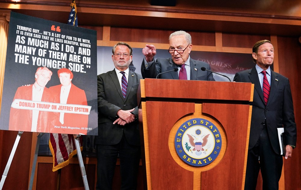 US Senate Minority Leader Chuck Schumer (C), alongside Senator Gary Peters (L), and Senator Richard Blumenthal (R), speaking during a news conference calling on the Trump administration to release further information on the Jeffrey Epstein case on July 30, 2025 at the US Capitol.