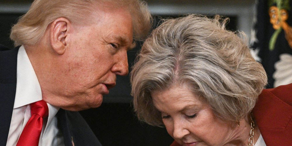 President Donald Trump leans in to speak with White House Chief of Staff Susie Wiles at the White House.
