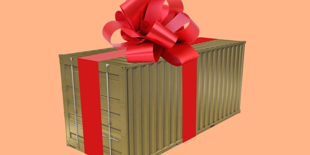 An illustration of a shipping container with a bow on top