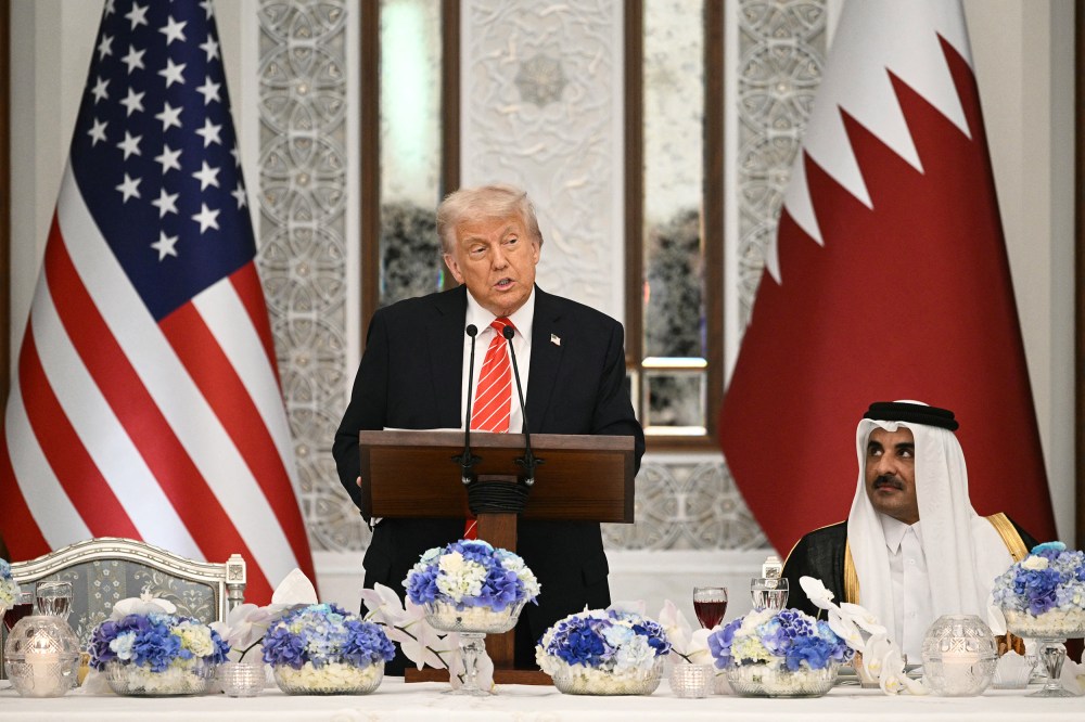 President Donald Trump and Qatar's Emir Sheikh Tamim bin Hamad al-Thani at a state dinner at the Lusail Palace in Doha, Qatar.