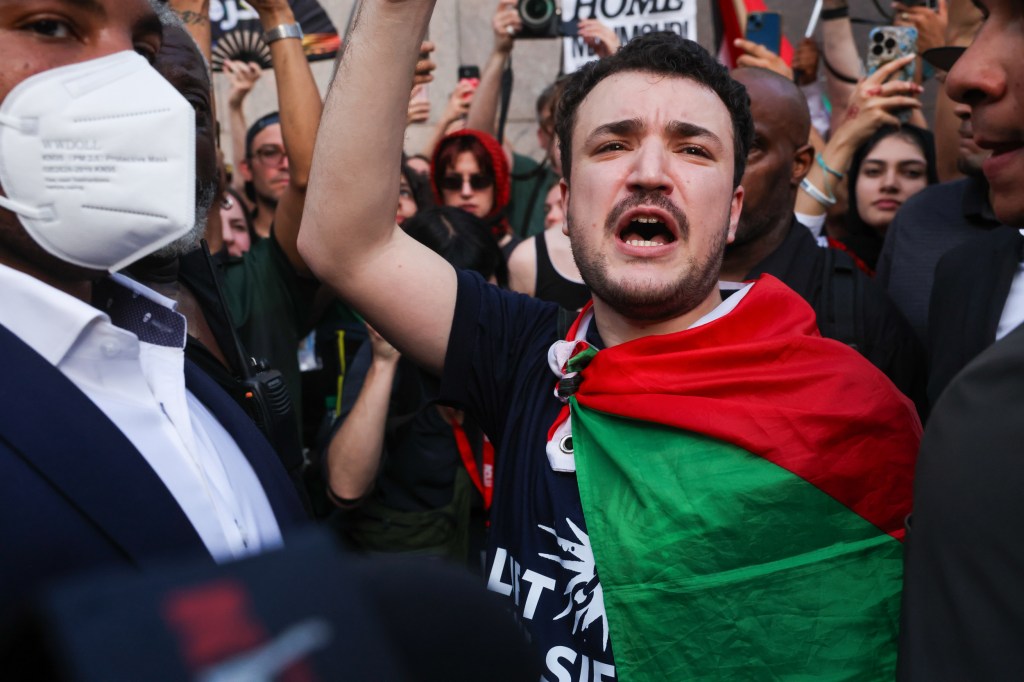 Palestinian activist Mahmoud Khalil marches with supporters.
